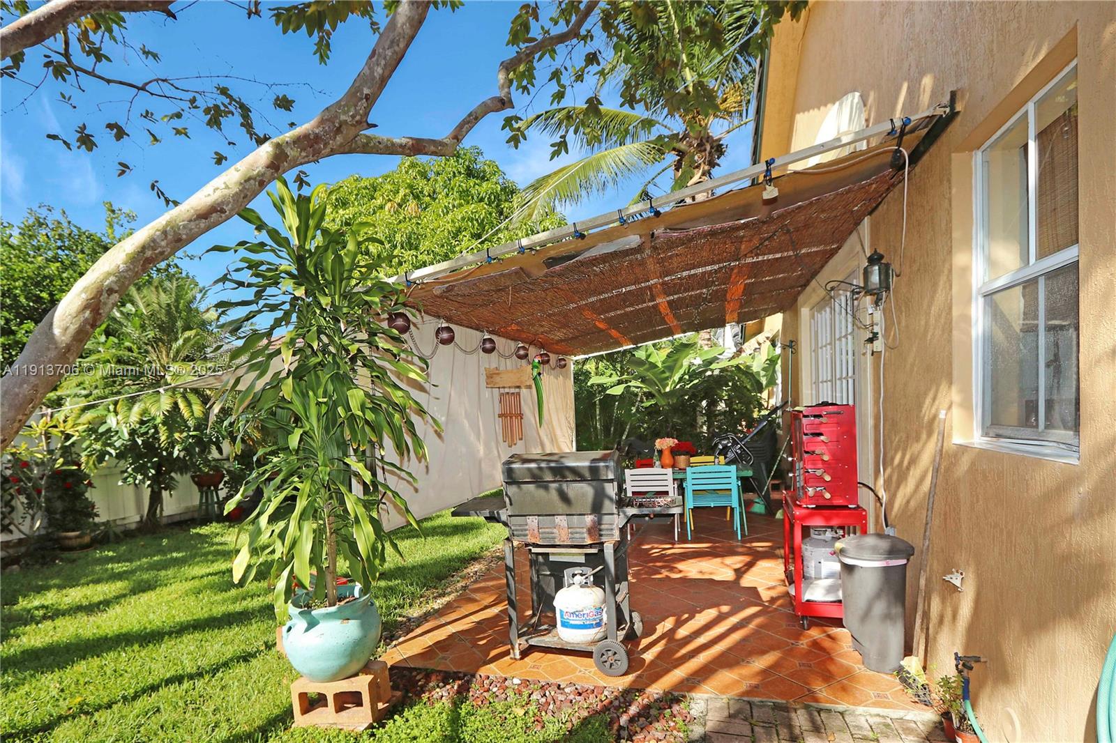 15382 Southwest 16th Terrace Miami, FL 33185 - Photo 21 of 26 an outdoor space with seating