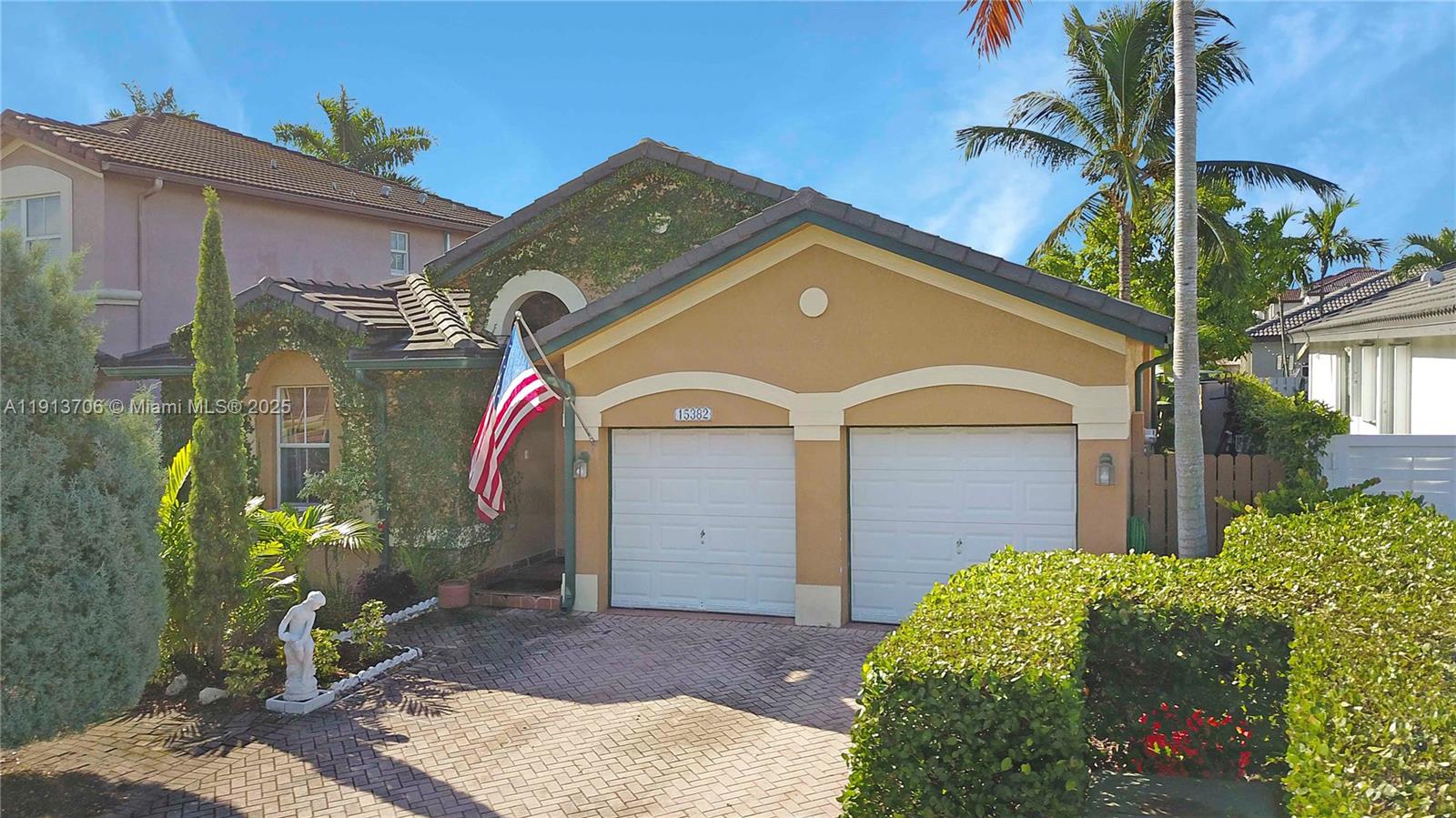 15382 Southwest 16th Terrace Miami, FL 33185 - Photo 23 of 26 a front view of a house with a yard