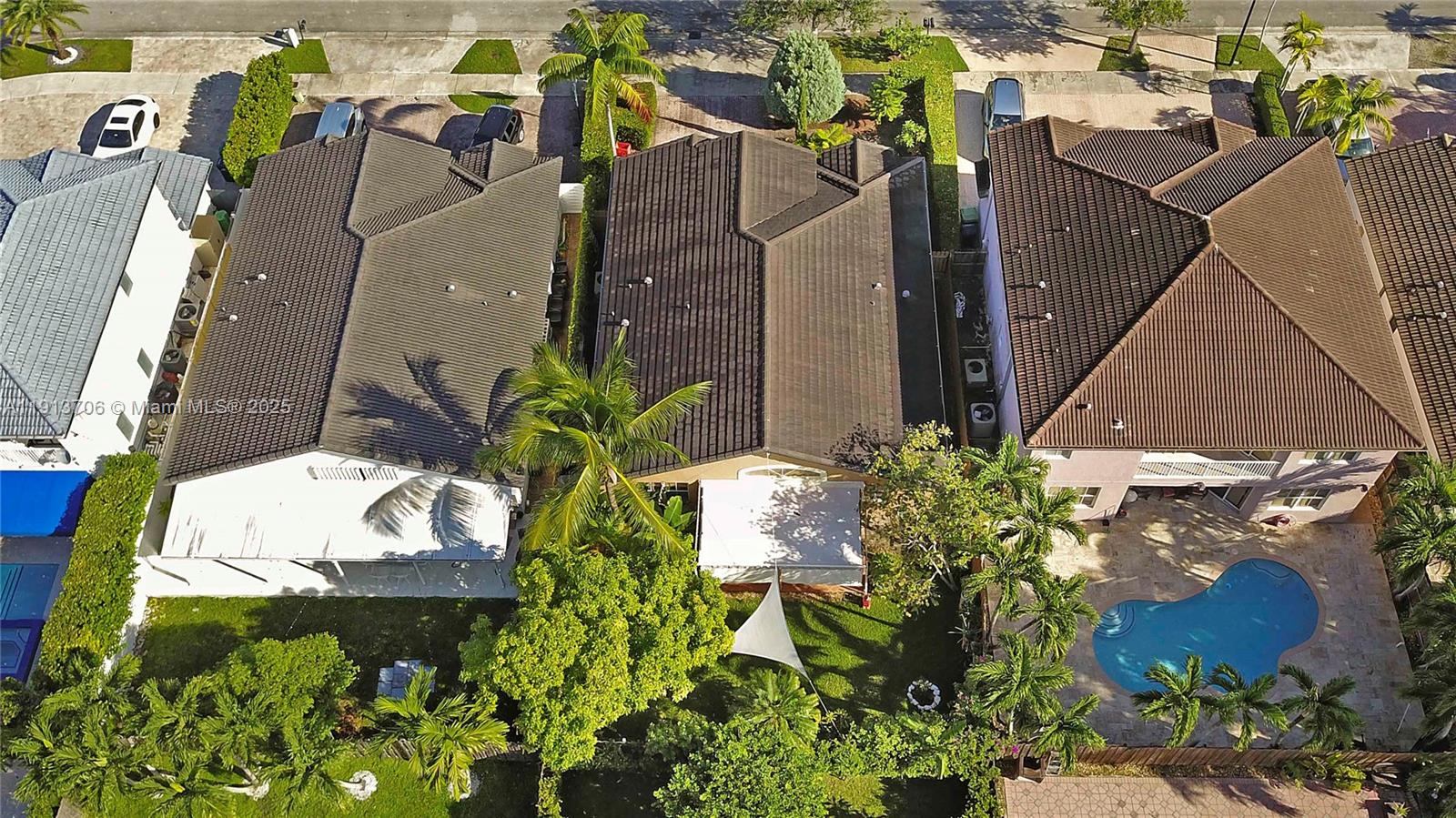 15382 Southwest 16th Terrace Miami, FL 33185 - Photo 25 of 26 a view of a house with a yard and plants