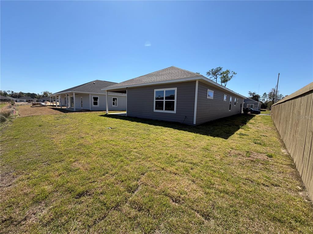 1021 Southwest 67th Street Gainesville, FL 32607 - Photo 34 of 53 a house with a yard