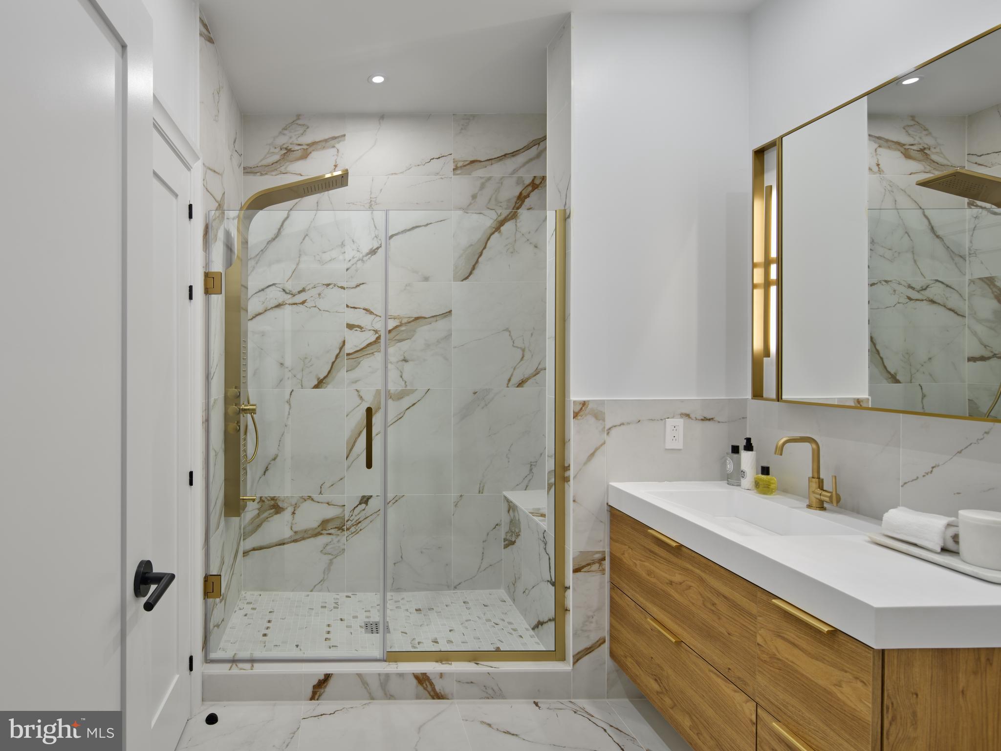 1001 South Broad Street, Unit 3 BR R Philadelphia, PA 19147 - Photo 4 of 13 a bathroom with a sink and a shower