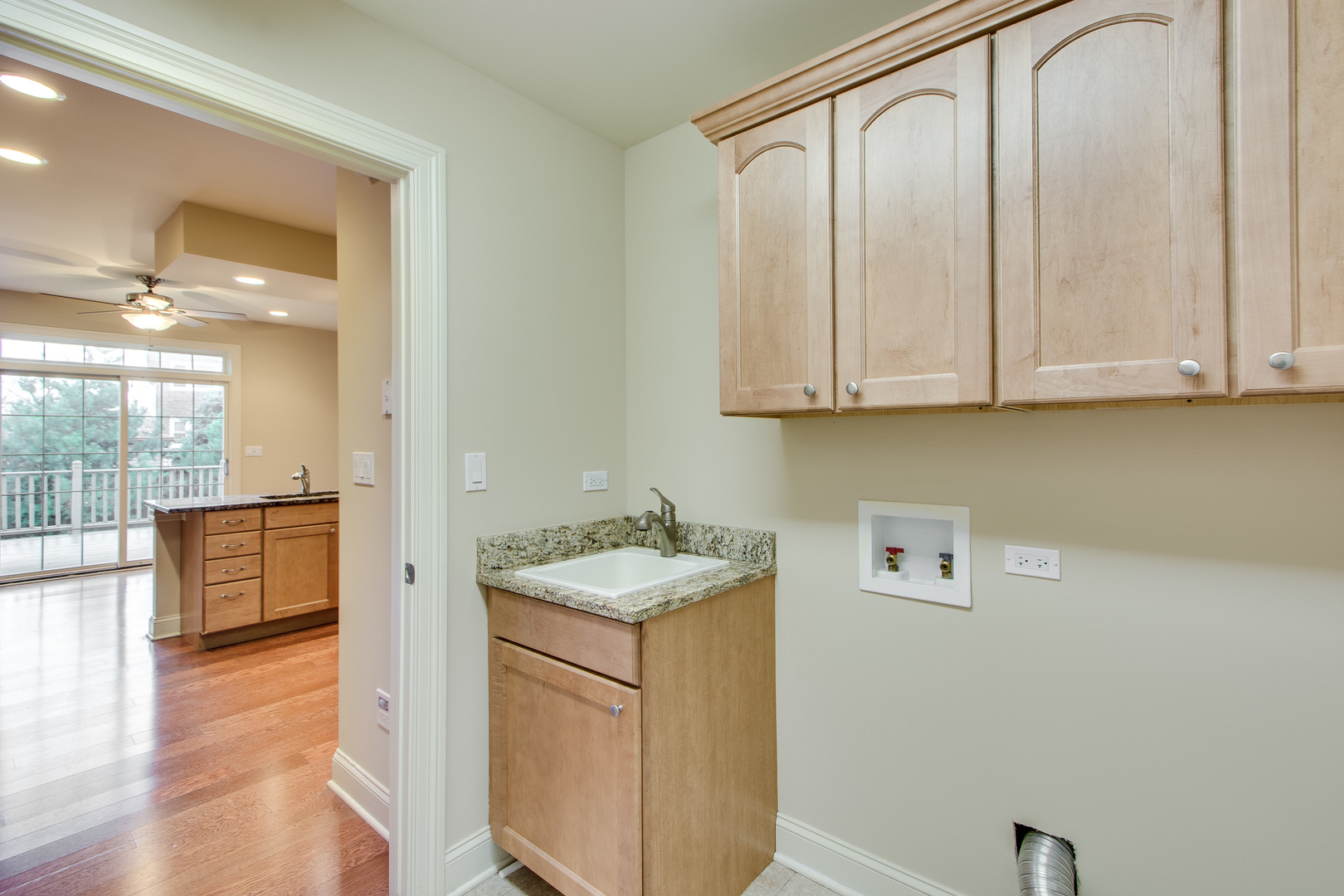 8705 Covington Place Justice, IL 60458 - Photo 13 of 30 a utility room with faucet washer and dryer