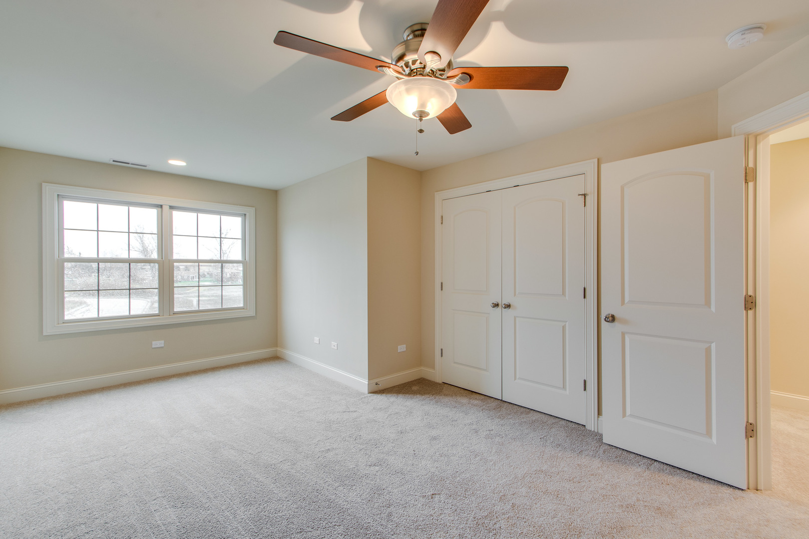 8705 Covington Place Justice, IL 60458 - Photo 18 of 30 a view of an empty room with a window