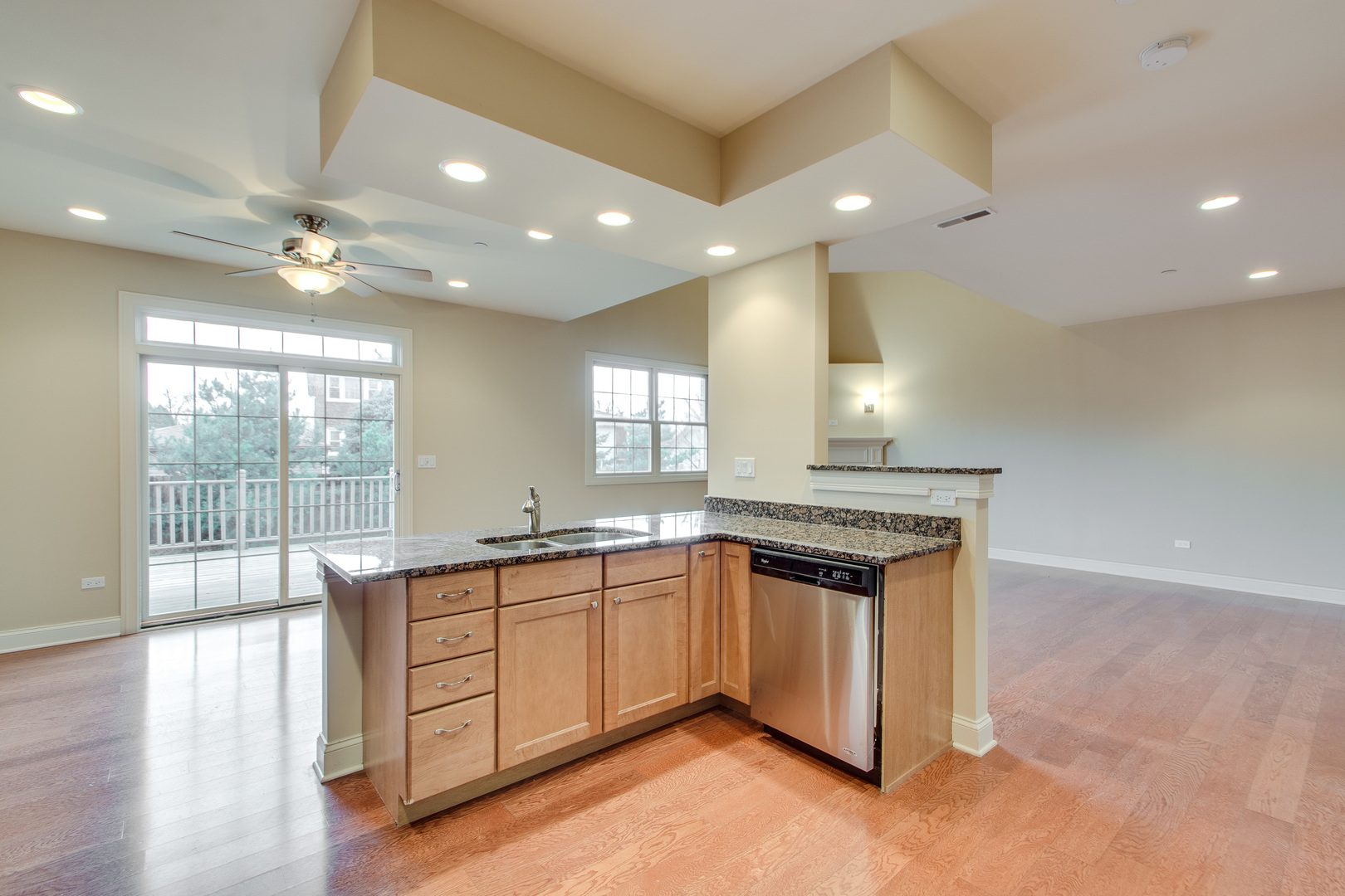 8705 Covington Place Justice, IL 60458 - Photo 9 of 30 a kitchen with stainless steel appliances granite countertop a stove and a sink