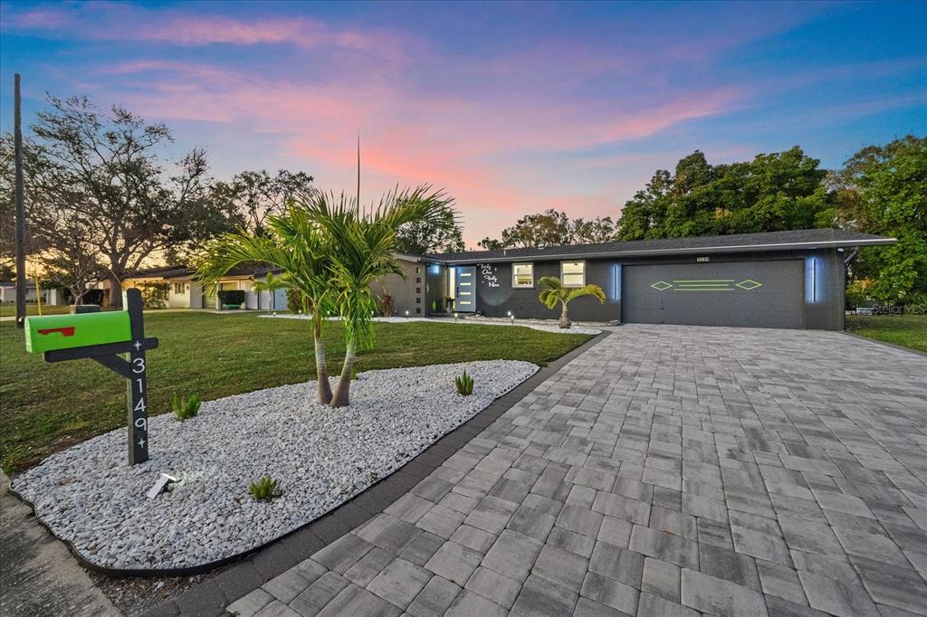 a view of a backyard with a garden
