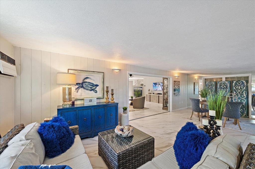 3149 Homasassa Road Sarasota, FL 34239 - Photo 21 of 62 a living room with furniture and a large window
