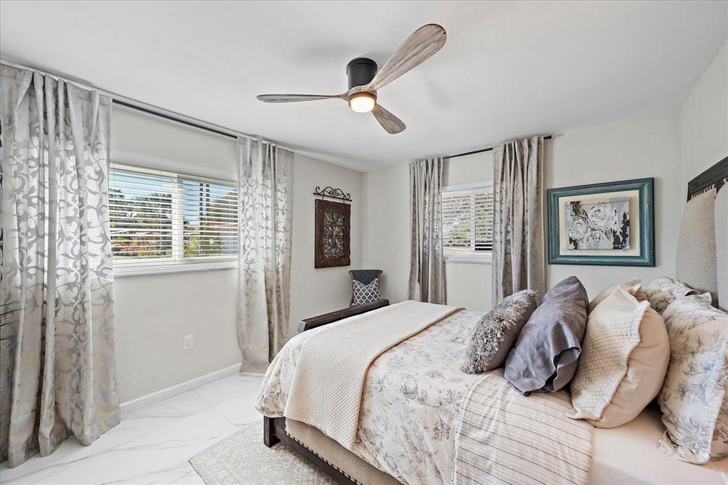 3149 Homasassa Road Sarasota, FL 34239 - Photo 32 of 62 a bedroom with a bed and a window