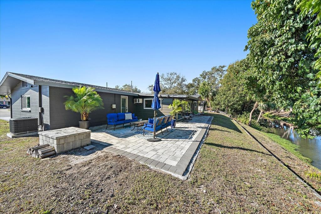 3149 Homasassa Road Sarasota, FL 34239 - Photo 39 of 62 a view of a house with backyard and sitting area