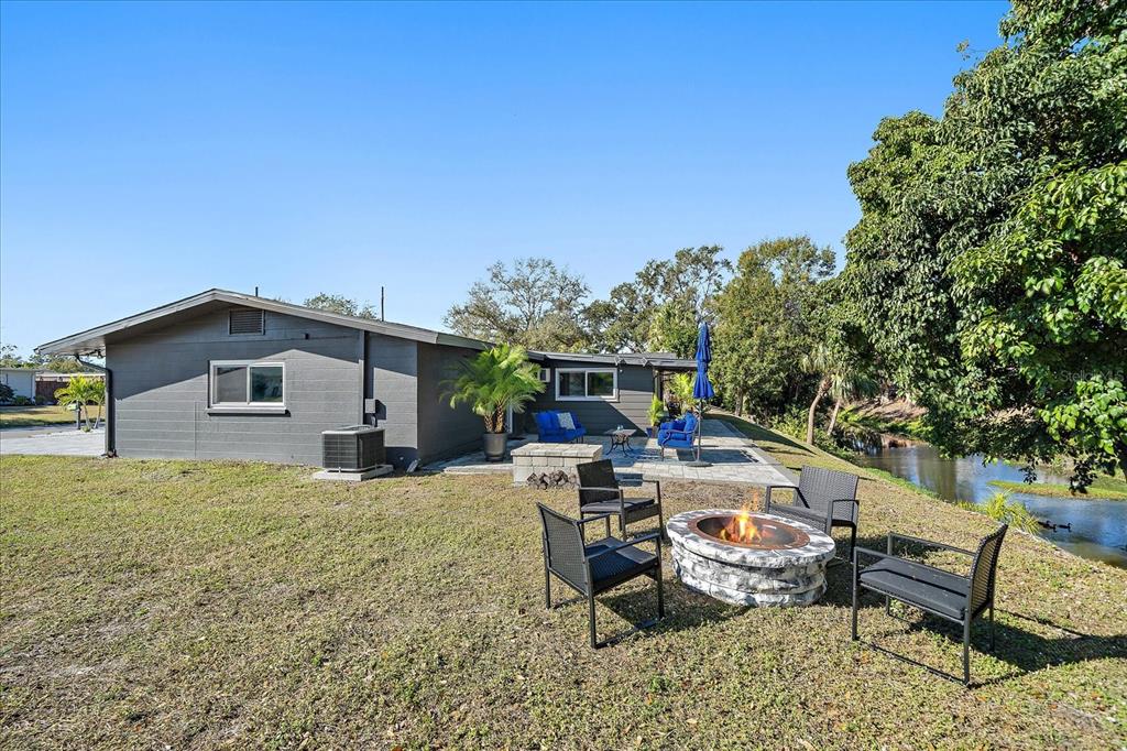 3149 Homasassa Road Sarasota, FL 34239 - Photo 41 of 62 a view of a house with backyard and sitting area