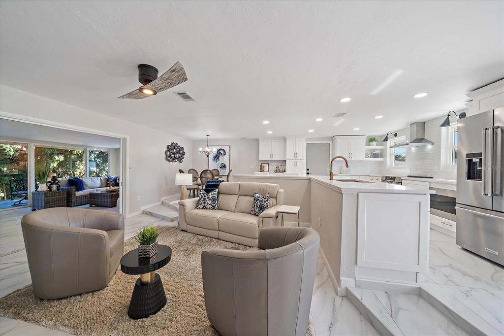 3149 Homasassa Road Sarasota, FL 34239 - Photo 7 of 62 a living room with furniture and kitchen view