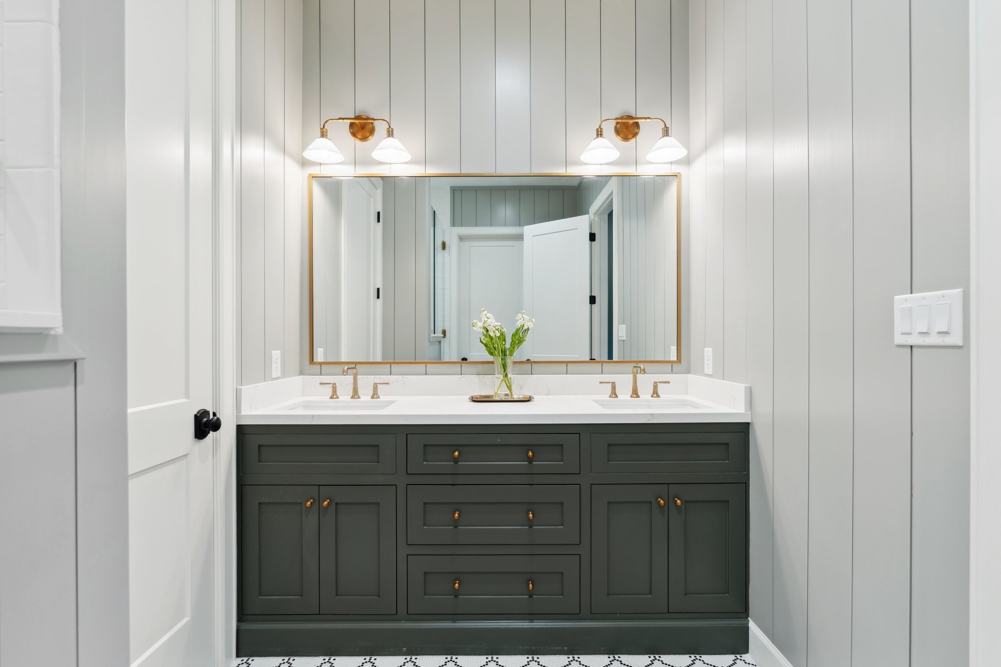 4052 Kuykendall Road Bellville, TX 77418 - Photo 11 of 40 Discover the elegance of the primary bathroom, featuring a spacious shower, dual sinks, and ample closet space.
