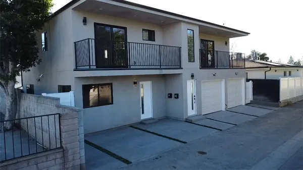 a front view of a house with balcony