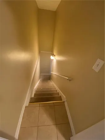 a view of a room with water heater and storage