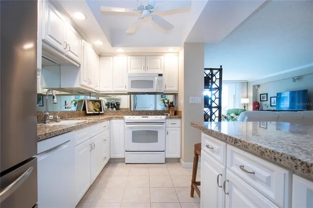a view of a balcony with wooden floor and outdoor space