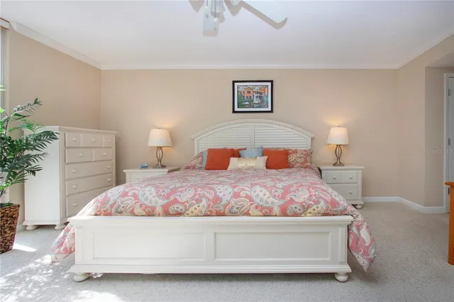 a en suite bathroom with a double vanity sink and a mirror