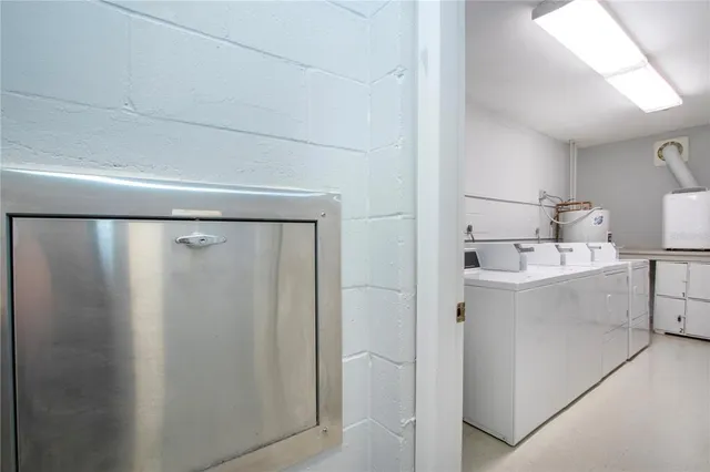 a room with gym equipment and equipment