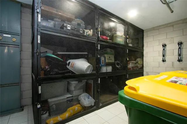 a living room with furniture and gym equipment