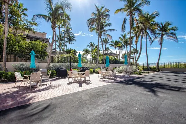 a view of swimming pool in he middle of the yard