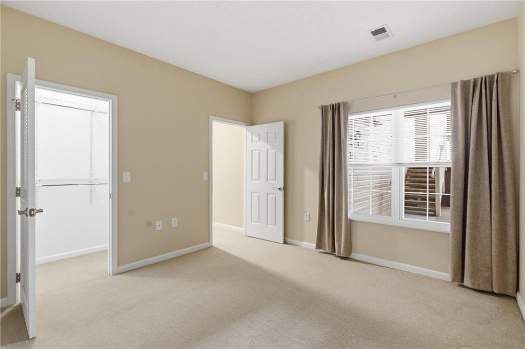 411 Stockton Ridge Cranberry Township, PA 16066 - Photo 19 of 32 a view of an empty room with a window