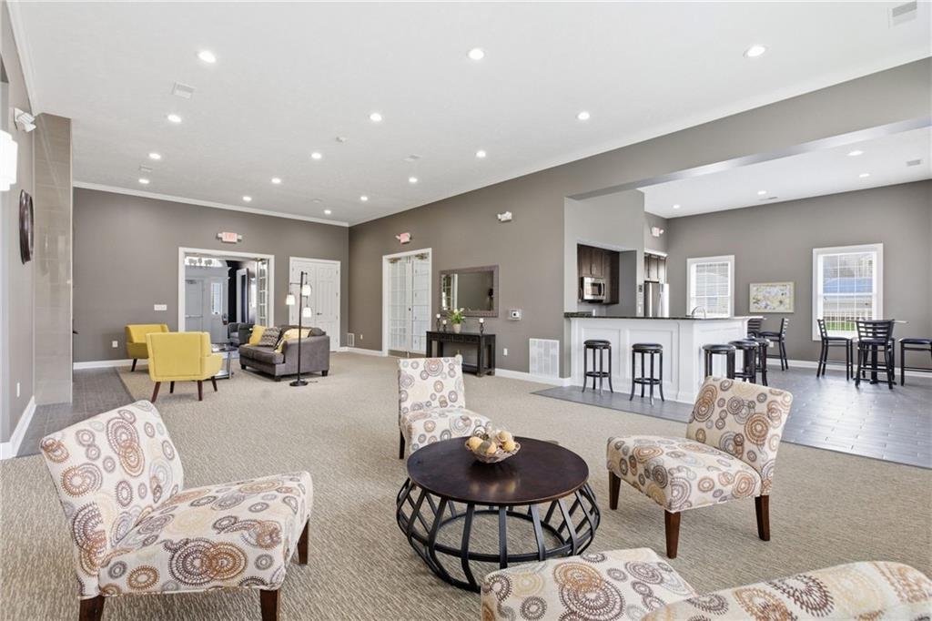 411 Stockton Ridge Cranberry Township, PA 16066 - Photo 27 of 32 a living room with furniture and wooden floor