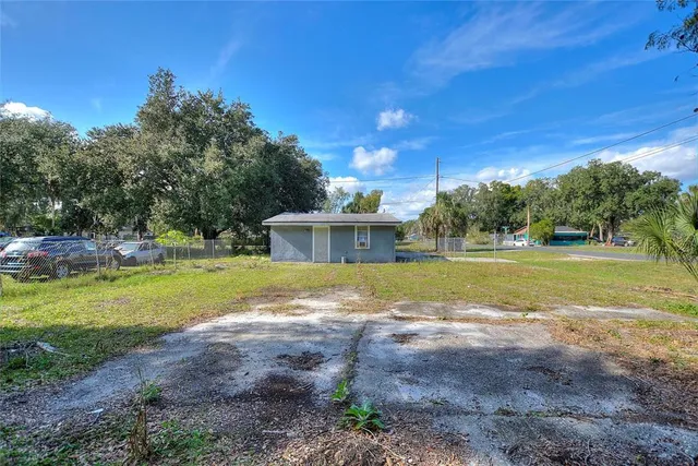 a view of a house with a big yard