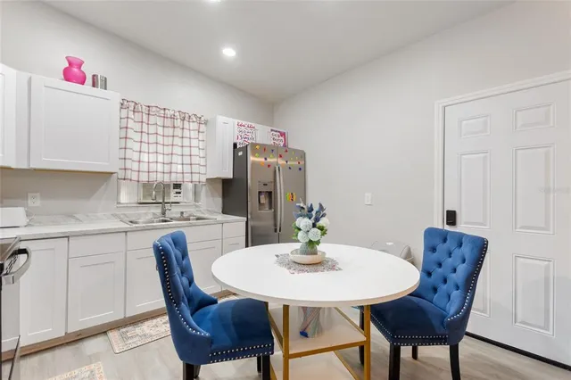 a view of a dining room with furniture