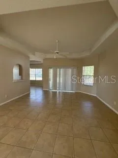 a view of an empty room and window