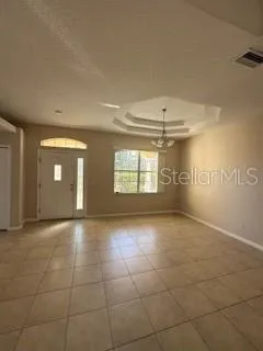 a view of an empty room and window