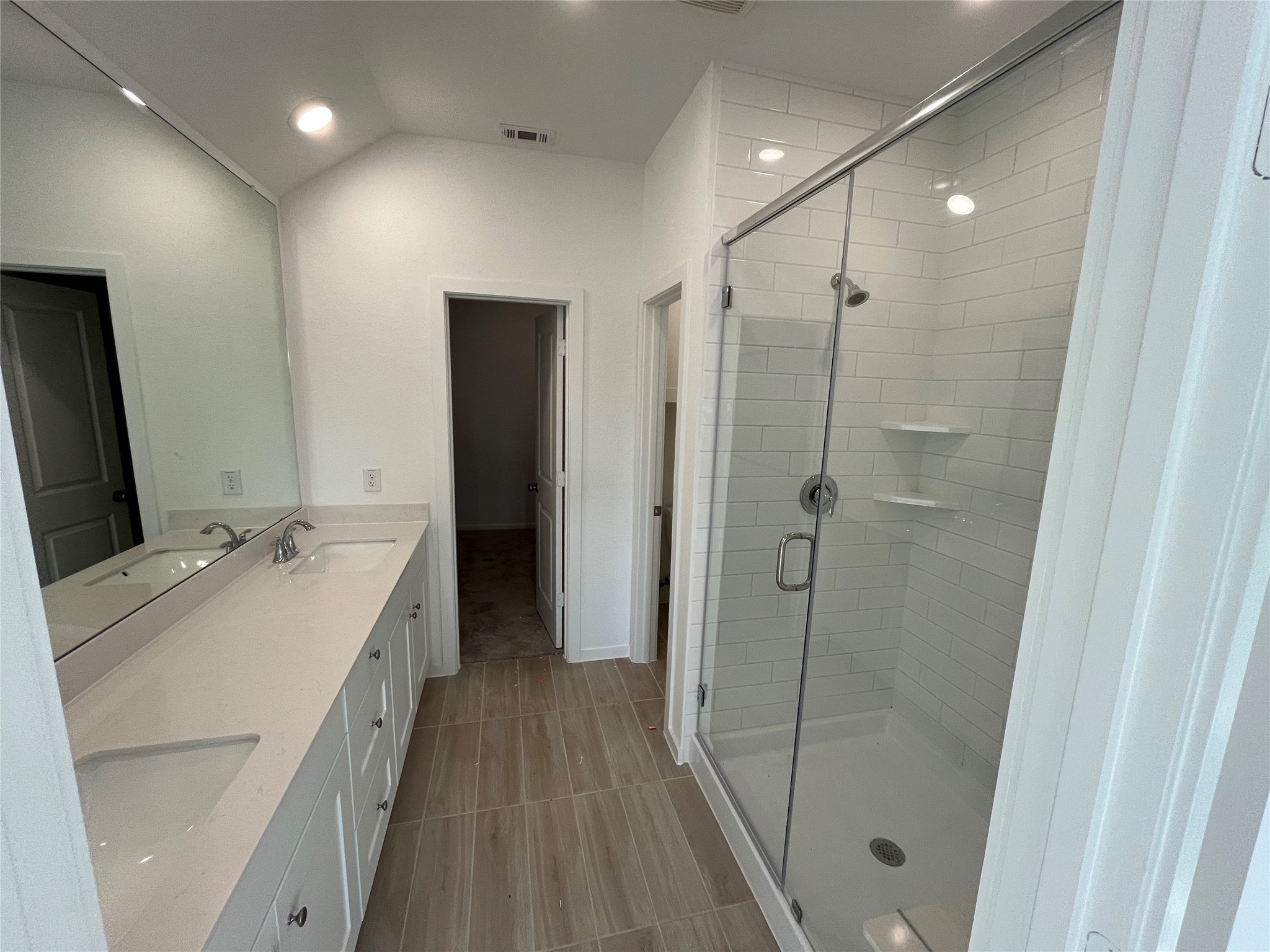 28959 Rustic Robin Drive Hockley, TX 77447 - Photo 13 of 13 a bathroom with a sink a toilet and shower