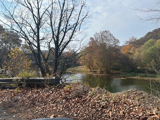 O Midland Road Midland, PA 15059 - Photo 1 of 10 a view of a lake with a mountain