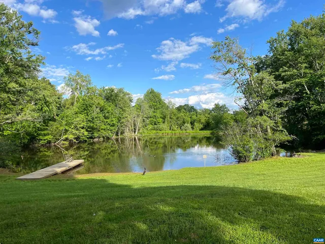 a view of a lake from a yard