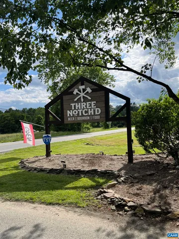 a sign that is on the side of a road