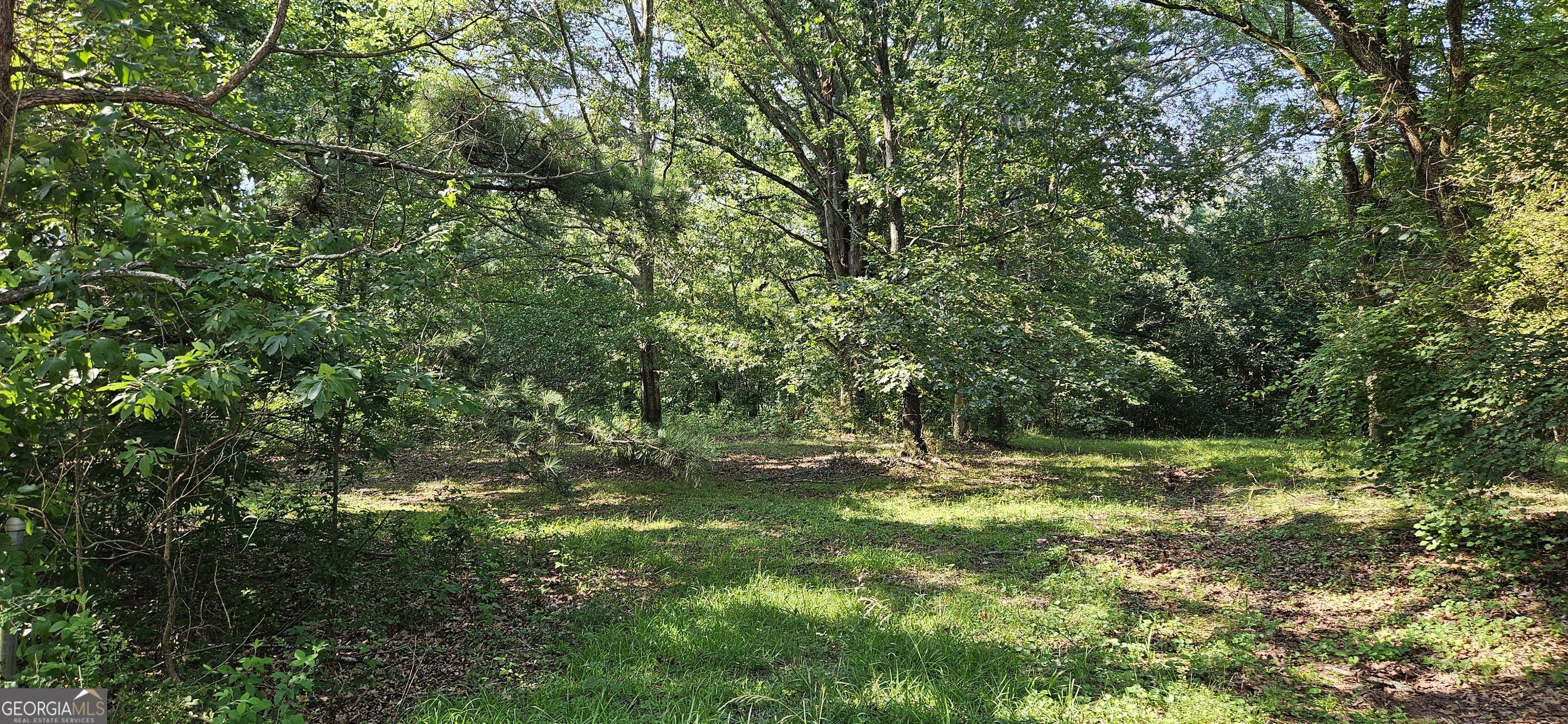 94 Matthews School Road Winder, GA 30680 - Photo 11 of 13 a view of outdoor space with deck and yard