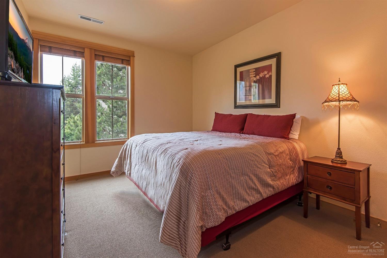 57166 Evergreen Loop Sunriver, OR 97707 - Photo 10 of 19 The second master suite provides a quiet