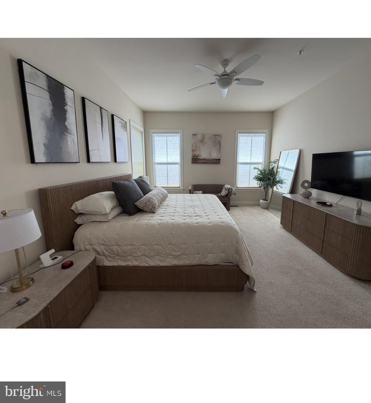 322 Patriots Path Malvern, PA 19355 - Photo 7 of 12 a bedroom with a bed and a flat screen tv