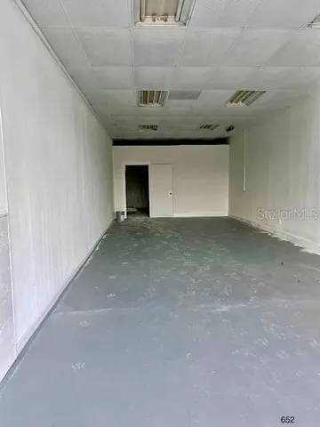 a view of a livingroom with a staircase