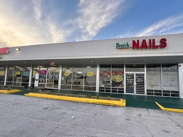 a view of an swimming pool with a yard