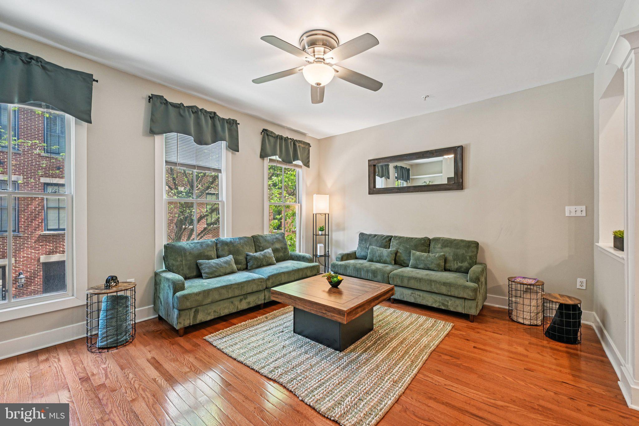 24 South Regester Street Baltimore, MD 21231 - Photo 9 of 44 a living room with furniture and a large window