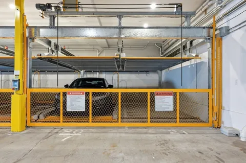 a view of a swimming pool with an outdoor seating