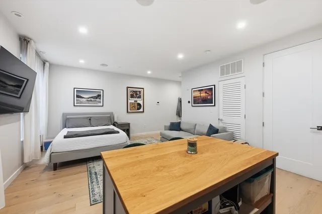 a bedroom with a bed and furniture