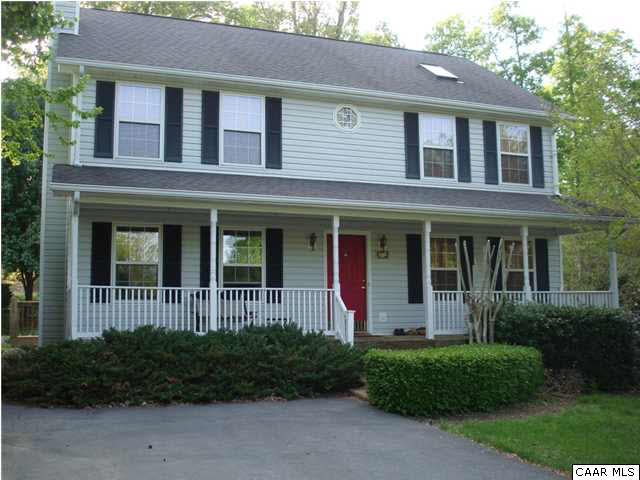 244 Starcrest Road Charlottesville, VA 22902 - Photo 1 of 17 a front view of a house with garden