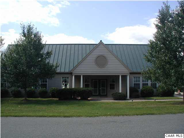 244 Starcrest Road Charlottesville, VA 22902 - Photo 13 of 17 a front view of a house with a garden