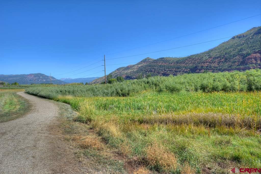 108 Twilight Trails Circle Durango, CO 81301 - Photo 12 of 12 a view of a lake with a mountain in the background
