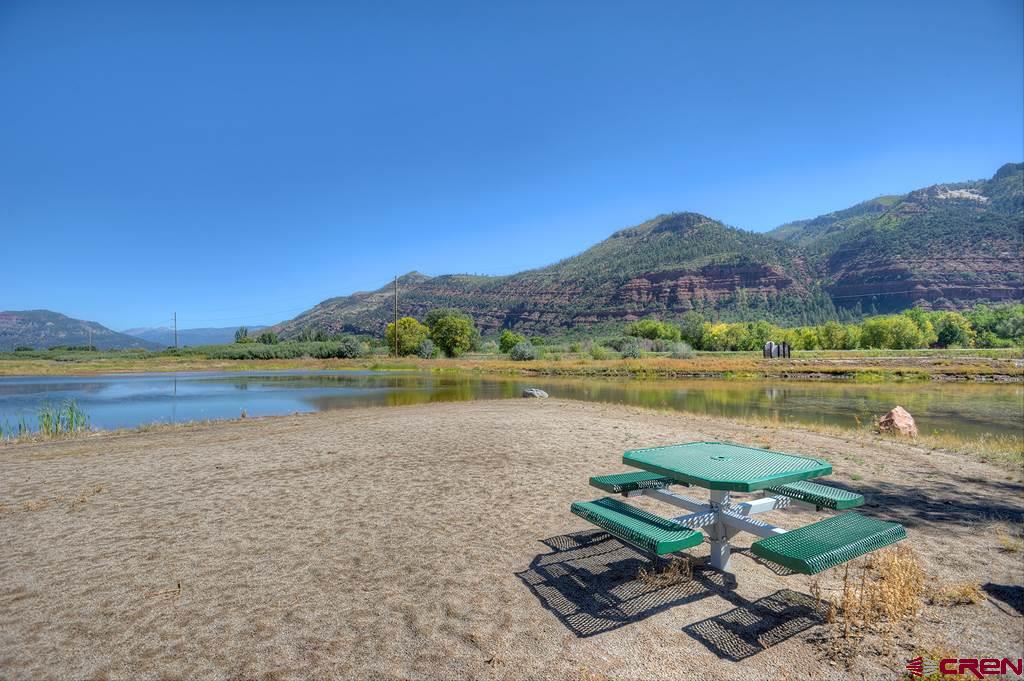 108 Twilight Trails Circle Durango, CO 81301 - Photo 10 of 12 a view of a lake with a mountain in the background