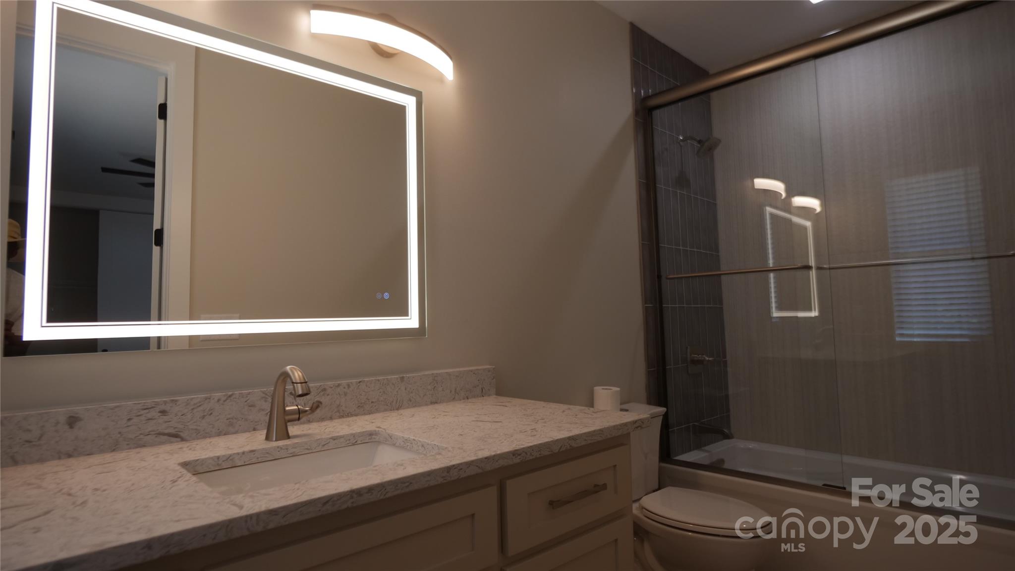 0 Concord Highway Monroe, NC 28112 - Photo 14 of 20 a bathroom with a sink a vanity and a mirror