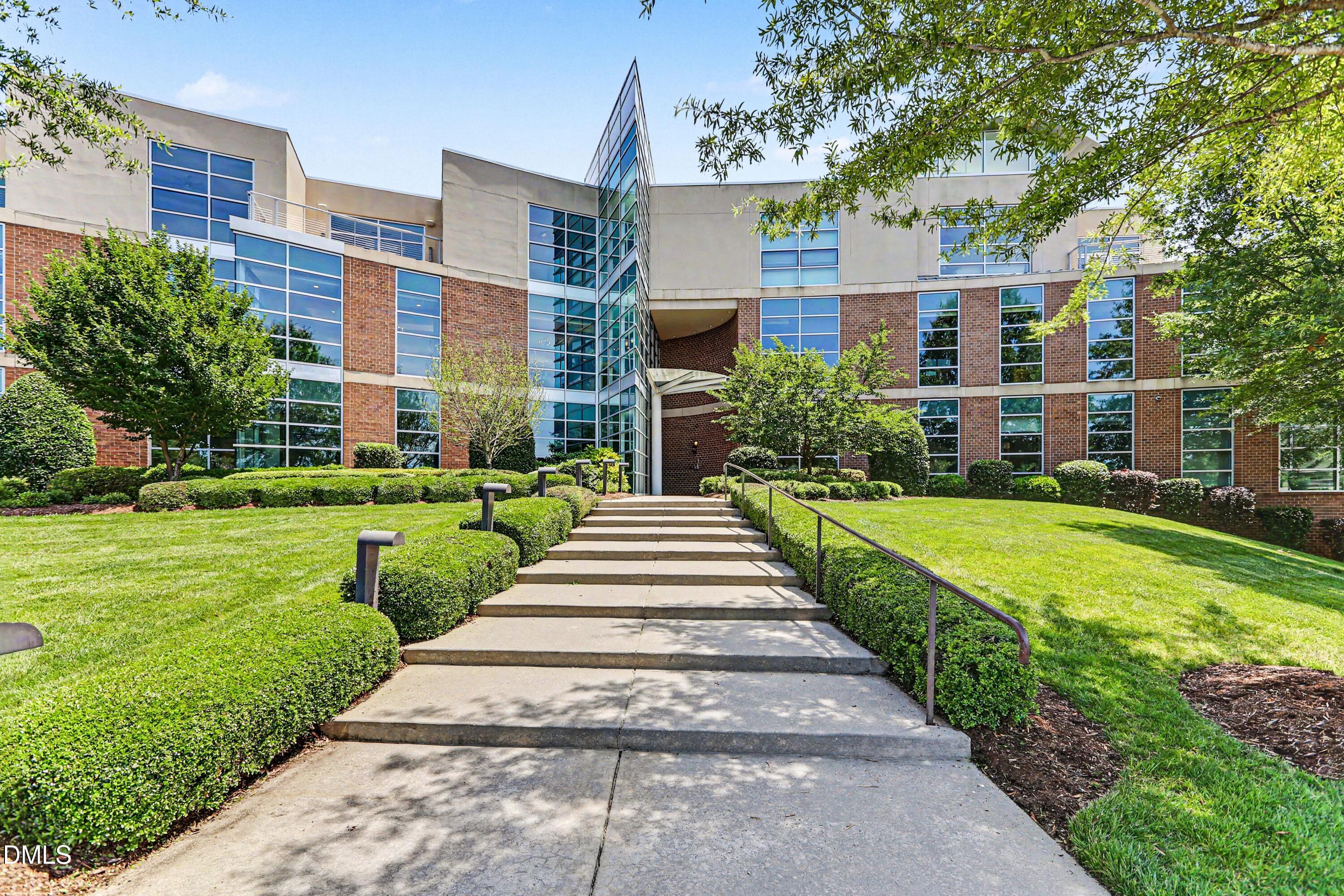331 West Barbee Chapel Road Chapel Hill, NC 27517 - Photo 2 of 92 a view of a building with a yard