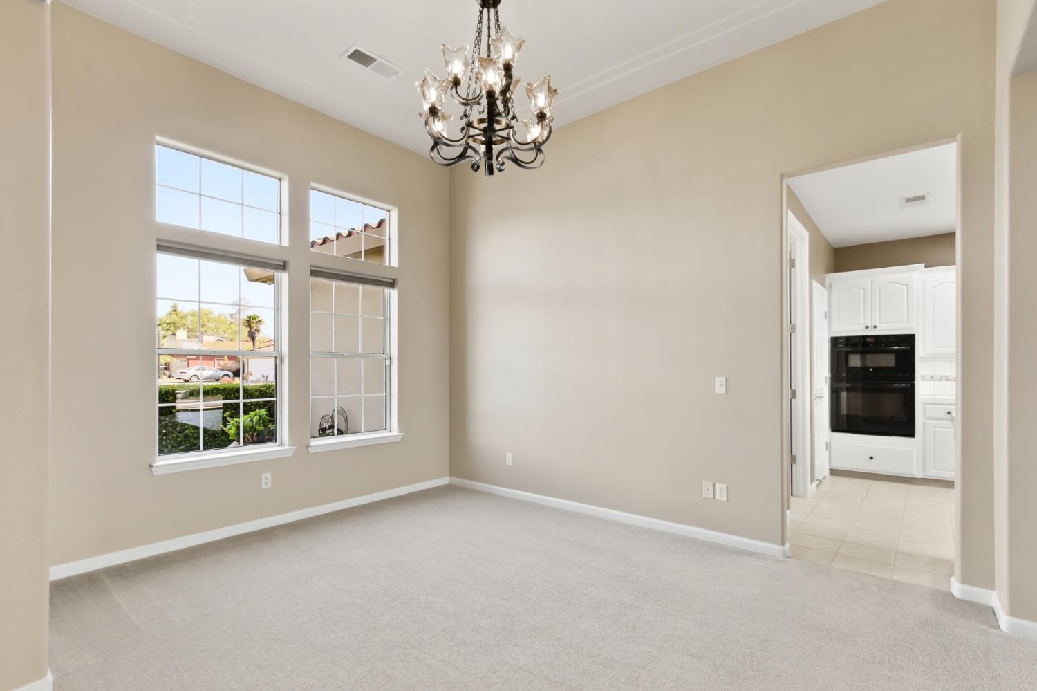 702 Shakeley Lane Ione, CA 95640 - Photo 15 of 71 a view of an empty room with a window
