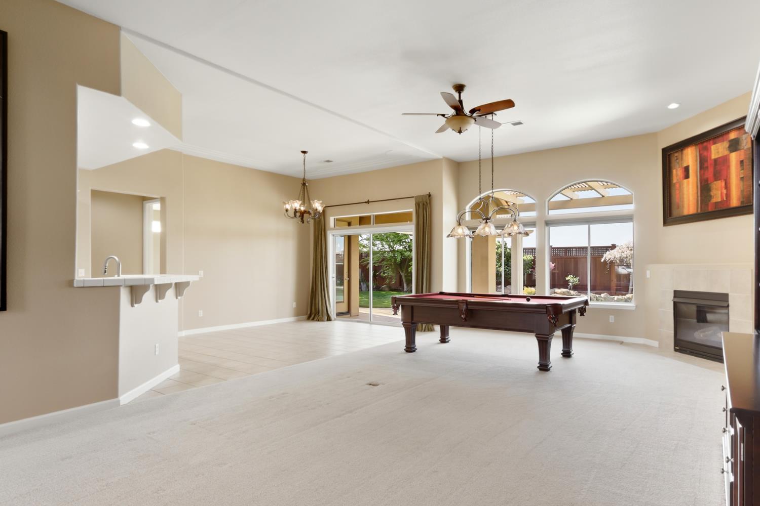 702 Shakeley Lane Ione, CA 95640 - Photo 17 of 71 a view of a livingroom with furniture and a ceiling fan