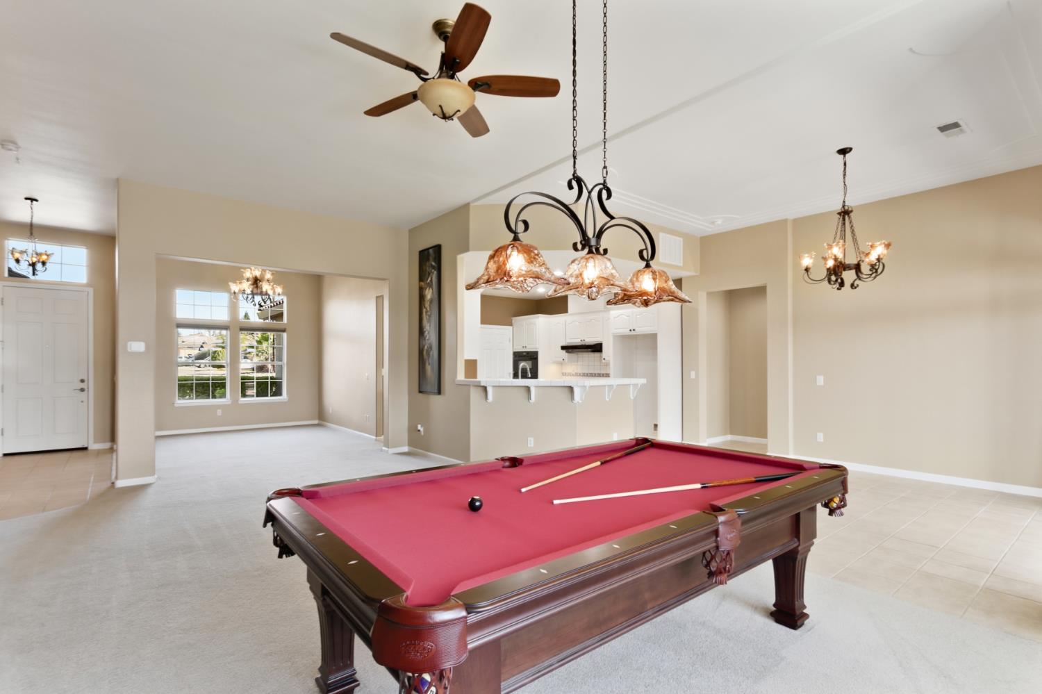 702 Shakeley Lane Ione, CA 95640 - Photo 23 of 71 a room with pool table and windows