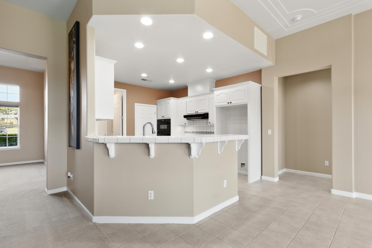 702 Shakeley Lane Ione, CA 95640 - Photo 25 of 71 a view of kitchen with stainless steel appliances refrigerator oven and cabinets